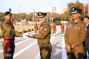 Inspector General of Police (IGP) Punjab Dr. Usman Anwar giving the souvenirs to the passing-out parade of the probationary officers during the passing out parade of 2nd Probationer Course at the Police Training College (PTC) Chung
