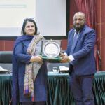 Additional Director Civil Services Academy Dr Syed Shabbir Akbar Zaidi presenting shield to Chairperson Benazir Income Support Program, Senator Rubina Khalid in BISP Headquarters