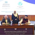 Secretary General of the Muslim World League, Sheikh Dr. Mohammed bin Abdulkarim al-Issa, witnesses Signing of International Partnership Agreements between Adviser to the Muslim World League, Maulana Zubair Hassan with President of the United Nation University for Peace Dr. Francisco Rojas Aravena during Closing ceremony of the International Conference Girls Education at Jinnah convention Centre