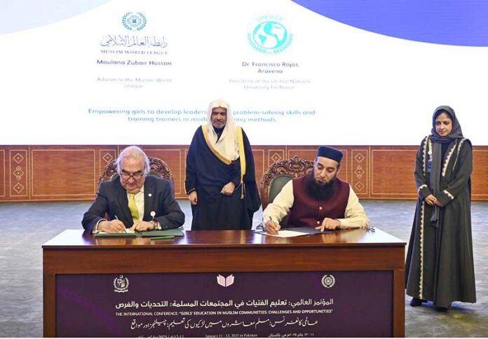Secretary General of the Muslim World League, Sheikh Dr. Mohammed bin Abdulkarim al-Issa, witnesses Signing of International Partnership Agreements between Adviser to the Muslim World League, Maulana Zubair Hassan with President of the United Nation University for Peace Dr. Francisco Rojas Aravena during Closing ceremony of the International Conference Girls Education at Jinnah convention Centre