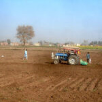 A farmer plows his field, preparing the land with hopes of a bountiful harvest for the next crop along Jhumra Road on the outskirts of the city