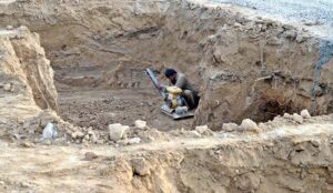 A labourer at work on the foundation of Electric Bus Charging terminal being built near Zero point Interchange in the federal capital.
