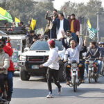 People gather on Mall Road to protest and mark Black Day, standing with Kashmiris on India's Republic Day