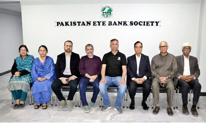 A group photo taken at an event Pakistan Eye Bank Society. They hosted a delegation from PEBS USA. The delegation was given a comprehensive tour of the facilities, followed by a discussion on future development projects, chaired by Qazi Sajid Ali, President of PEBS Hospital