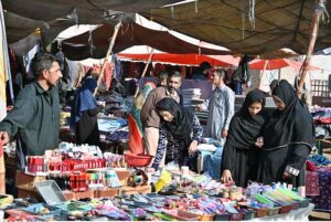 Women explore the Sasta Bazar, shopping for essential household items and making the most of the affordable prices to meet their daily needs