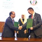 Secretary General of the Muslim World League, Sheikh Dr. Mohammed bin Abdulkarim al-Issa, witnesses Signing of International Partnership Agreements between Assistant to the Secretary General for Corporate Communications Muslim World League Dr. Mohammed Al-Majdouie with President of the International Public Chamber Alexander Olshevskiy during Closing ceremony of the International Conference Girls Education at Jinnah convention Centre