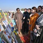 Child Protection Specialist UNICEF Muhammad Sohail visiting painting stall during the closing ceremony of PDA Food & Culture Family Festival with the support of UNICEF at Regi Model Town Park