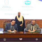 Secretary General of the Muslim World League, Sheikh Dr. Mohammed bin Abdulkarim al-Issa, witnesses Signing of International Partnership Agreements between Professor Dr. Sami Al-Sharif, Secretary General of the League of Islamic Universities with Dean of the College of Faculty of Islamic Call, Dr. Abu Bakr Abu Suwair during Closing ceremony of the International Conference Girls Education at Jinnah convention Centre