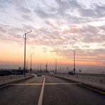 An eye catching view of sunset with scattered clouds over Sirinagar Highway in the federal capital