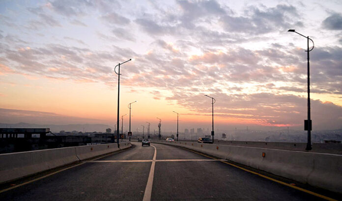 An eye catching view of sunset with scattered clouds over Sirinagar Highway in the federal capital