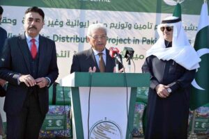 Federal Minister for National Food Security and Research Rana Tanveer Hussain addressing a ceremony as KSrelief launches major initiative to provide shelter NFIs and Winter Kits in Pakistan 2025 at Pakistan Sports Complex with Saudi Ambassador Nawaf Bin Said Al-Maliki