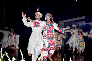 Artists enthusiastically present the cultural dance showcasing the diverse and vibrant heritage of Pakistan during the opening ceremony of the 12th Waxnet Exhibition 2025