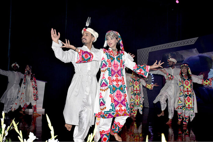 Artists enthusiastically present the cultural dance showcasing the diverse and vibrant heritage of Pakistan during the opening ceremony of the 12th Waxnet Exhibition 2025