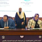 Secretary General of the Muslim World League, Sheikh Dr. Mohammed bin Abdulkarim al-Issa, witnesses Signing of International Partnership Agreements between Senior Advisor the Muslim World League Dr. Ibrahim Al-Shaibi with Director General SESRIC Mrs. Zehra Zumrut Selcuk during Closing ceremony of the International Conference Girls Education at Jinnah convention Centre