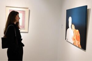 Art enthusiasts admire the stunning works displayed at the '9 in the Orion' painting exhibition at Gallery 6 in the Federal Capital