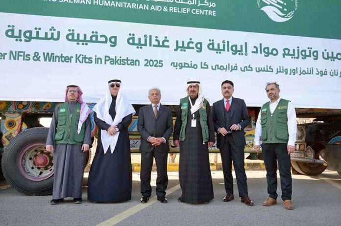 Federal Minister for National Food Security and Research Rana Tanveer Hussain in a group photo with Saudi Ambassador Nawaf Bin Said Al-Maliki at a ceremony as KSrelief launches major initiative to provide shelter NFIs and Winter Kits in Pakistan 2025 at Pakistan Sports Complex