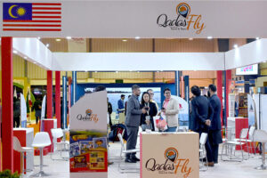 Women Visitor taking interest at Hotels & Resorts Pavilion stall during the Pakistan Travel Mart (PTM) 2025 at Expo Centre