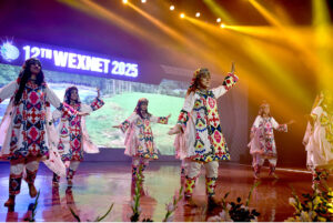 Artists enthusiastically present the cultural dance showcasing the diverse and vibrant heritage of Pakistan during the opening ceremony of the 12th Waxnet Exhibition 2025