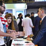 Visitors taking interest in stalls during the Pakistan Travel Mart (PTM) 2025 at Expo Centre