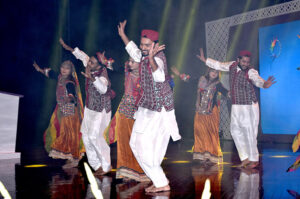 Artists enthusiastically present the cultural dance showcasing the diverse and vibrant heritage of Pakistan during the opening ceremony of the 12th Waxnet Exhibition 2025