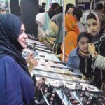 Visitors viewing products at Mera Brand Pakistan exhibition at Expo Centre