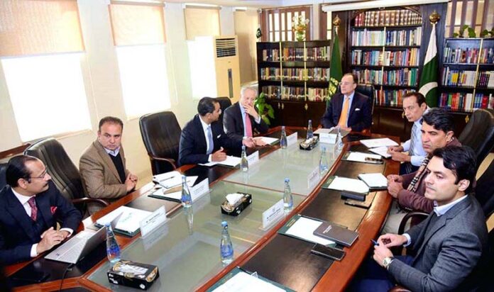 Federal Minister for Finance and Revenue, Senator Muhammad Aurangzeb, chairs a meeting with the leadership of the Pakistan Microfinance Investment Company (PMIC). The PMIC delegation led by Naveed A. Khan, Chairman PMIC