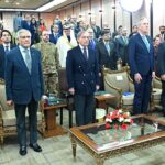 Prime Minister Muhammad Shehbaz Sharif and other guests standing in respect of the national anthem of Pakistan during the launching ceremony of World Bank's Country Partnership Framework for Pakistan