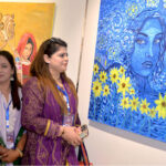 Visitors keenly viewing paintings during 10th Hyderabad literature festival at Sindh museum