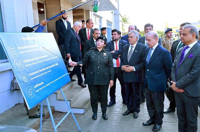 Prime Minister Muhammad Shehbaz Sharif receives briefing regarding the Faceless Customs Assessment System at South Asia Pakistan Terminal