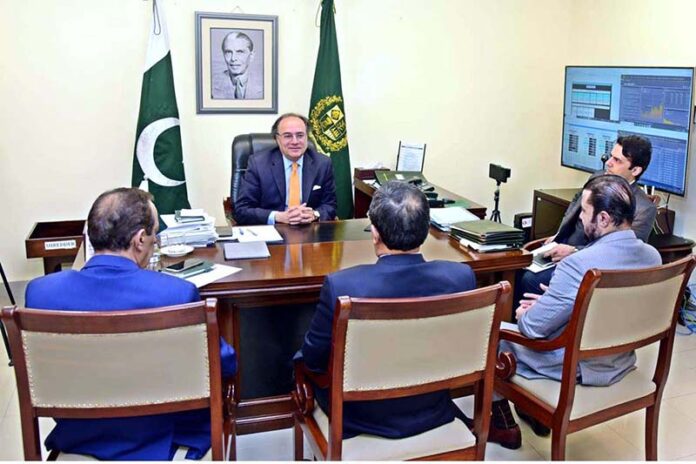 Federal Minister for Finance and Revenue Senator Muhammad Aurangzeb holds a meeting with Yousaf Hussain, President of the Overseas Investors Chamber of Commerce & Industry (OICCI), who called on the Minister at Finance Division
