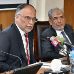 Federal Minister for Planning, Development & Special initiatives Mr. Ahsan Iqbal addressing members of the Overseas Investors Chamber of Commerce & Industry (OICCI) during Visit