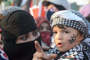 A large number of Participants, including women and children, to express solidarity and raise slogans in support of Palestinians during the Gaza Million March at Sea View