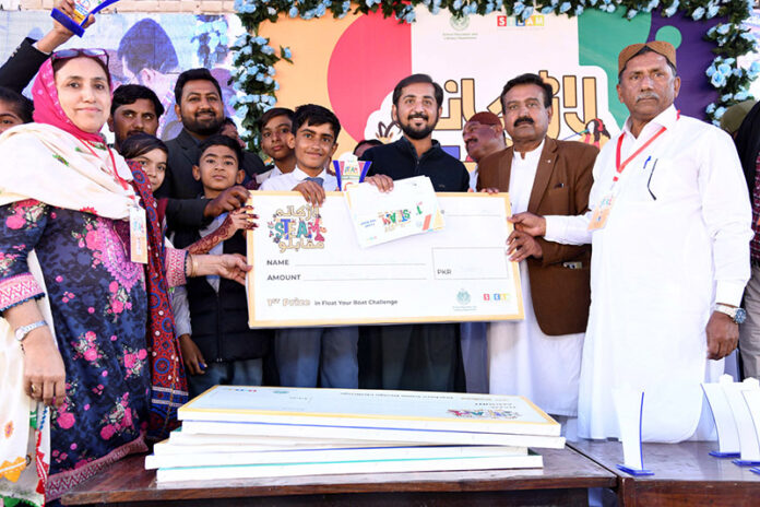Director Schools Education (E.S&H.S) Larkana Region Syed Safdar Ali Shah along with District Education Officer (ES&HS) Gul Bahar Magsi giving away prizes to the students of Government Boys Karma Bagh High School who secured first position in the STEM Competition 2025 at Govt. Pilot Higher Secondary School