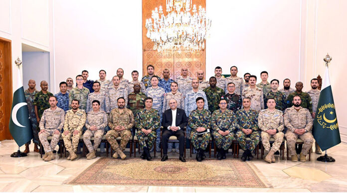 President Asif Ali Zardari in a group photo with the participants of the 38th Air War Course, currently undergoing training at the PAF Air War College Institute Karachi, at Aiwan-e-Sadr