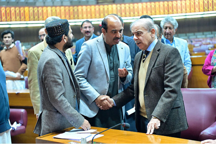 Prime Minister Muhammad Shehbaz Sharif meets parliamentarians during the National Assembly session