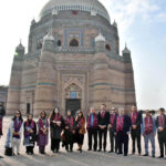 Officers of the National Institute of Public Administration (NIPA) pose for a group photo during their visit to the shrine of Shah Rukn-e-Alam