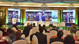 Federal Minister for Finance and Revenue, Senator Muhammad Aurangzeb delivers a virtual address at the “3rd Pakistan Climate Conference (PCC)”, organized by the Overseas Investors Chamber of Commerce and Industry (OICCI) at a hotel.