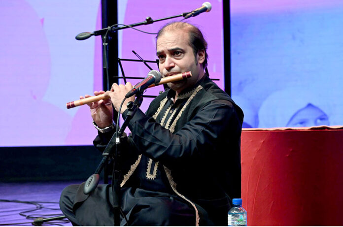 Flutist Salman Adil mesmerizes the audience with his flute performance at the Cultural Evening, honoring delegations of the International Conference on Girls’ Education at PNCA