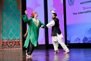 Artists performing folk dance at the Cultural Evening at PNCA, honoring delegations of the International Conference on Girls’ Education