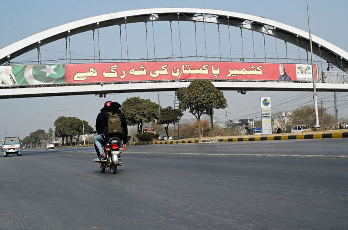 A view of banners displayed on a bridge along the Expressway in connection with Kashmir Solidarity Day