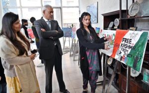 Executive Director General of DEMP Mubashir Tauqeer cutting ribbon to inaugurate Digital Photographic and Painting Exhibition organized by Directorate of Electronic Media and Publications, Ministry of Information and Broadcasting in connection with Kashmir Solidarity Day at Information Service Academy.