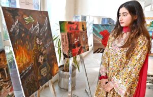 Executive Director General of DEMP Mubashir Tauqeer cutting ribbon to inaugurate Digital Photographic and Painting Exhibition organized by Directorate of Electronic Media and Publications, Ministry of Information and Broadcasting in connection with Kashmir Solidarity Day at Information Service Academy.
