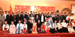 Charge d'affaires of Chinese Embassy H.E. Mr. Shi Yuanqiang in a group photograph with participants in a celebration event for the Chinese New Year, especially for the Lantern Festival at Local hotel