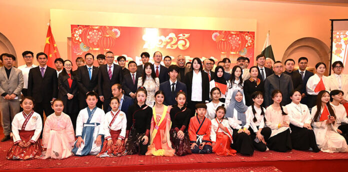 Charge d'affaires of Chinese Embassy H.E. Mr. Shi Yuanqiang in a group photograph with participants in a celebration event for the Chinese New Year, especially for the Lantern Festival at Local hotel