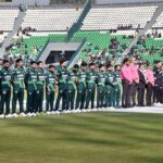 Players of Pakistan and New Zealand cricket teams standing in respect of national anthems of both countries before start of the first match of Tri-Nation Series at Gaddafi Stadium