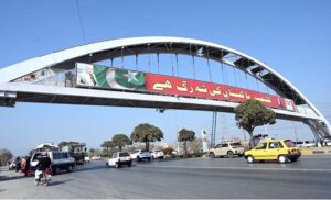 A view of the flags of Pakistan and Azad Kashmir displayed on a bridge in connection with Kashmir Solidarity Day, observed on February 5, to honor the struggle and unmatched sacrifices of the oppressed Kashmiris in Indian Illegally Occupied Jammu and Kashmir (IIOJK).