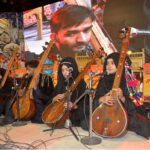 Folk artist performing Shah Latif poetry during Sindh Sufi Melo at Sindh museum
