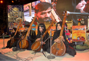 Folk artist performing Shah Latif poetry during Sindh Sufi Melo at Sindh museum