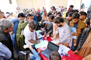 Officials of Network of Organizations Working with People with Disabilities, Pakistan (NOWPDP) are busy registering to disabled persons at the Special CNIC Camp organized in collaboration with NADRA at Rehabilitation Centre of Multiple Handicapped Children.