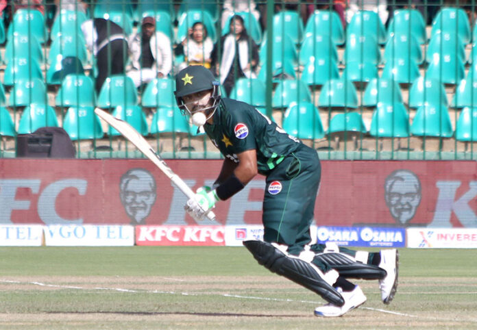 Pakistan's Babar Azam plays a shot during the final one-day international (ODI) cricket match of Tri-Nation series between Pakistan and New Zealand at the National Stadium